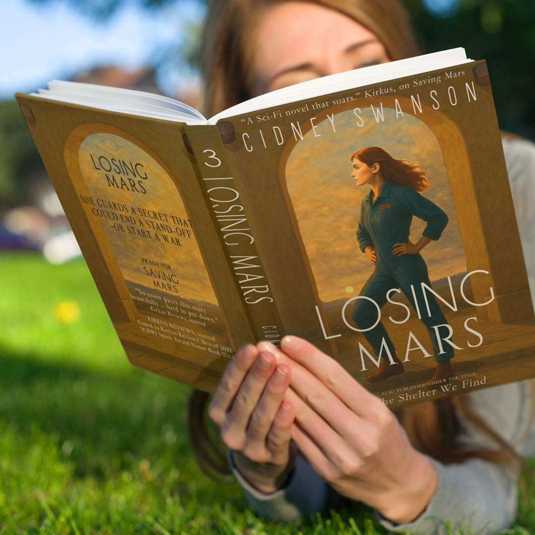 Girl reading Losing Mars by Cidney Swanson | clean YA sci-fi for ages 10+, part of the Saving Mars series.
