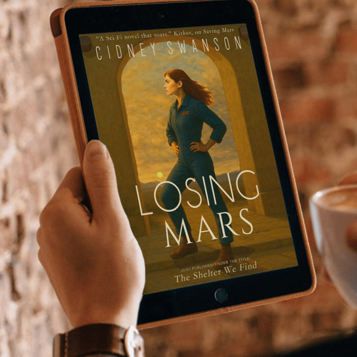 Man holding Losing Mars by Cidney Swanson | clean YA sci-fi for ages 10+, part of the Saving Mars series.