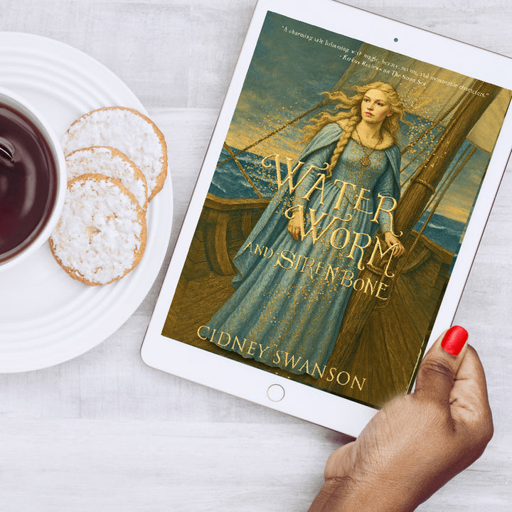 woman holding Water Worm and Siren Bone by Cidney Swanson | lyrical YA fantasy for ages 12–17, part of the Five Kingdoms Chronicles.