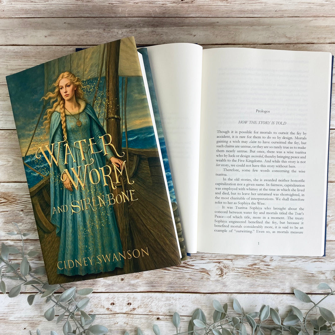 Open page of Water Worm and Siren Bone by Cidney Swanson | lyrical YA fantasy for ages 12–17, part of the Five Kingdoms Chronicles.