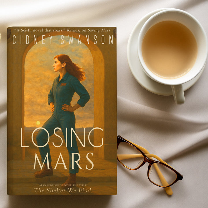 copy of Losing Mars by Cidney Swanson — clean YA sci-fi for ages 10+, third in the Saving Mars series, with glasses and a teacup.