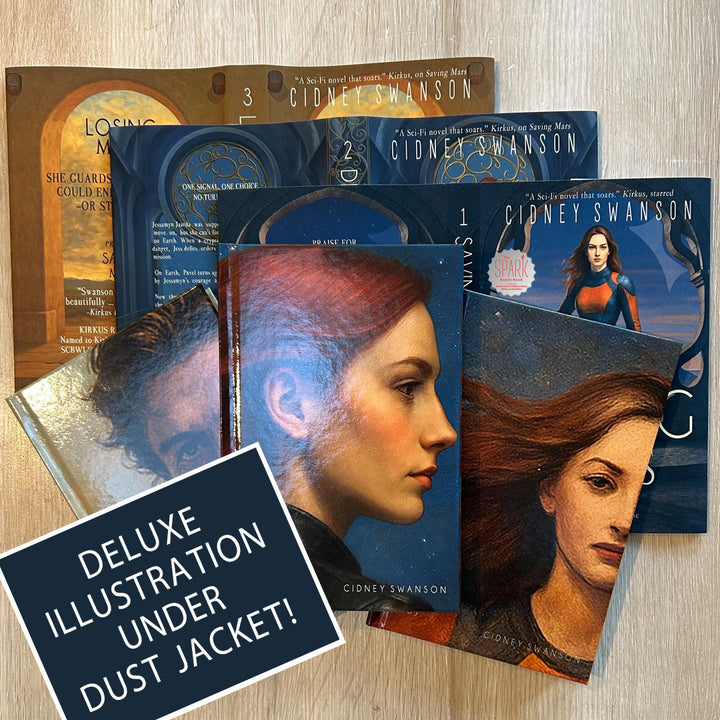Collection of Saving Mars books by Cidney Swanson with illustrated covers on a wooden surface